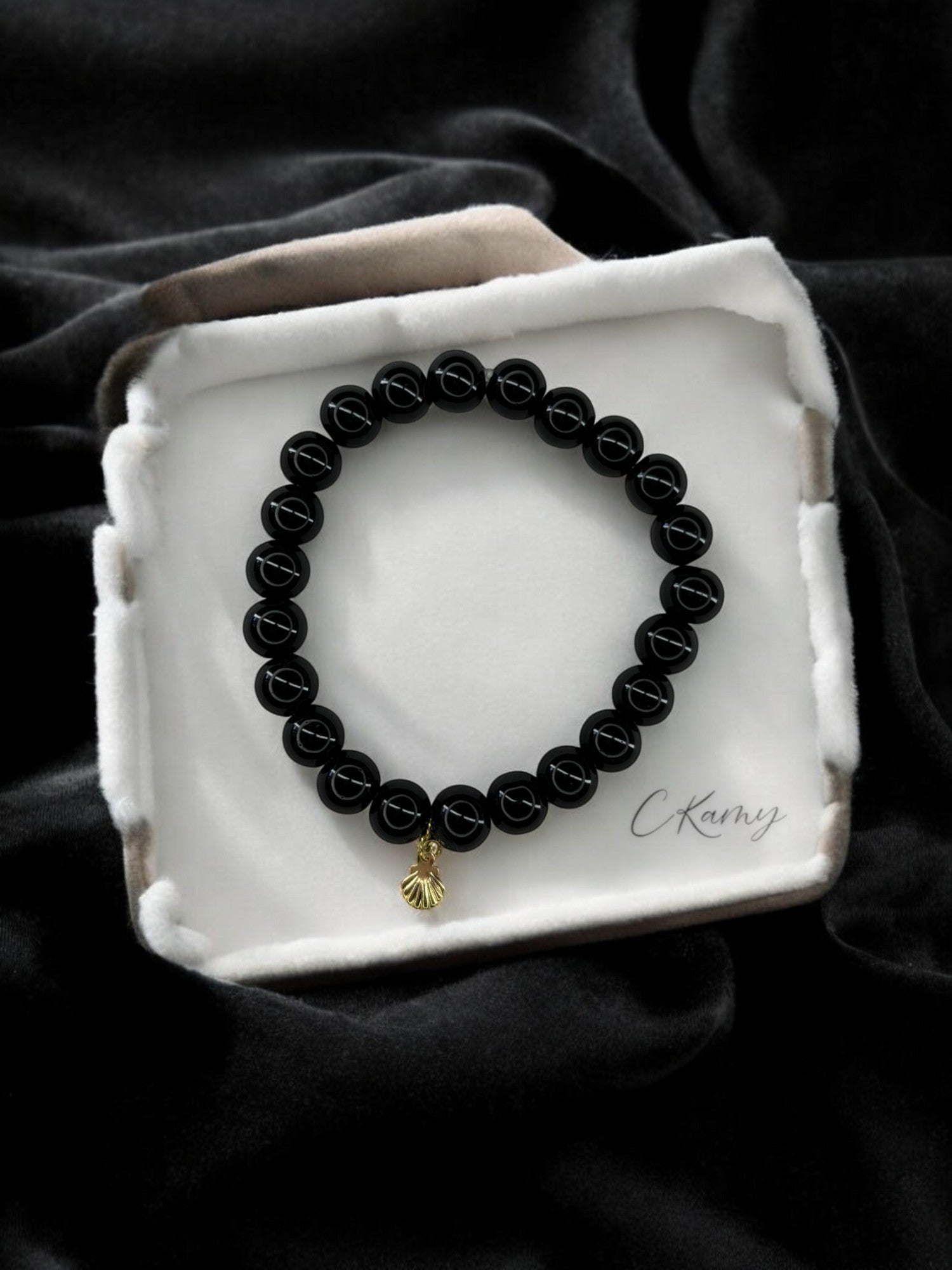 Bracelet femme perles de verres coquillage doré noir