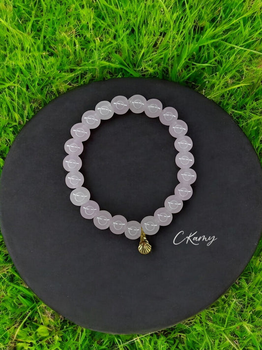 Bracelet femme perles de verres coquillage doré violet clair
