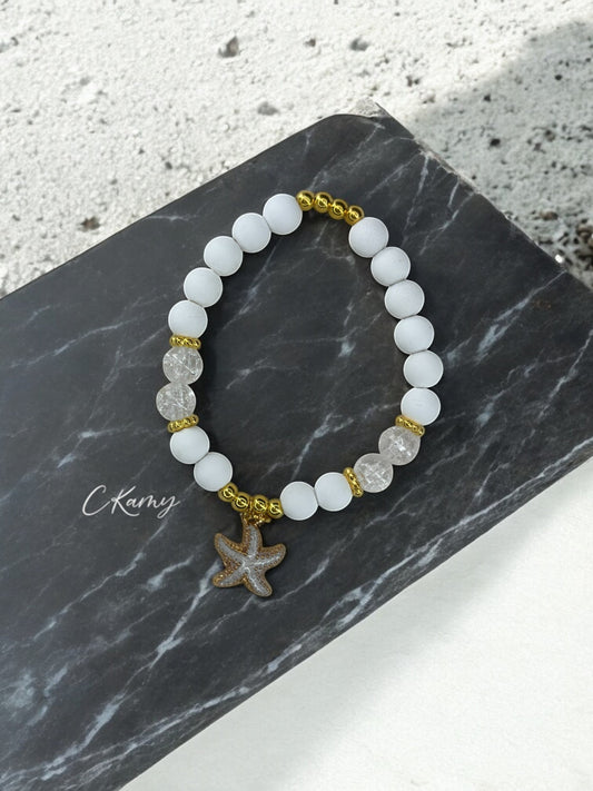 Bracelet femme perles mattes blanc étoile de mer blanc