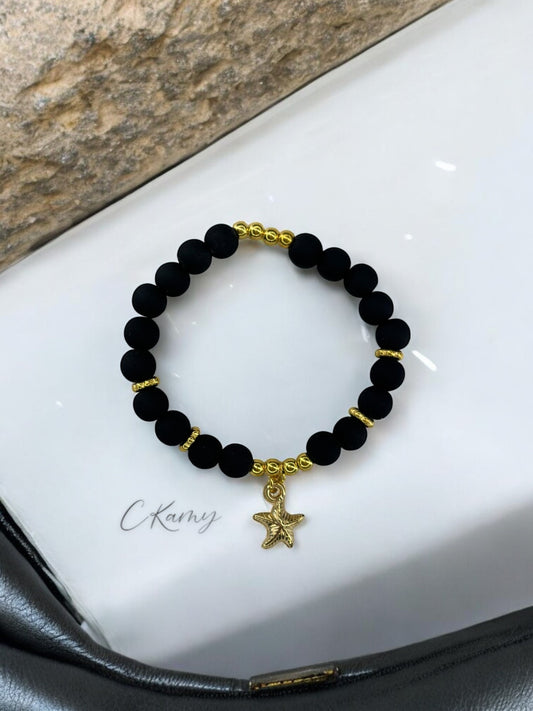 Bracelet femme perles mattes épaisse étoile de mer noir