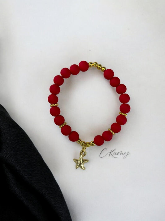 Bracelet femme perles mattes épaisse étoile de mer rouge