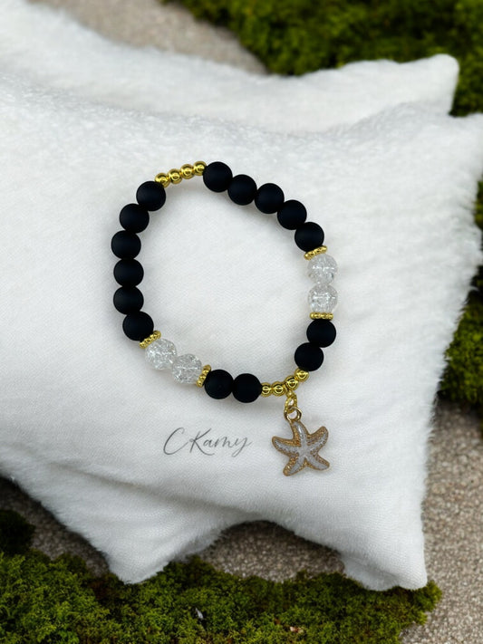 Bracelet femme perles mattes noir étoile de mer blanc