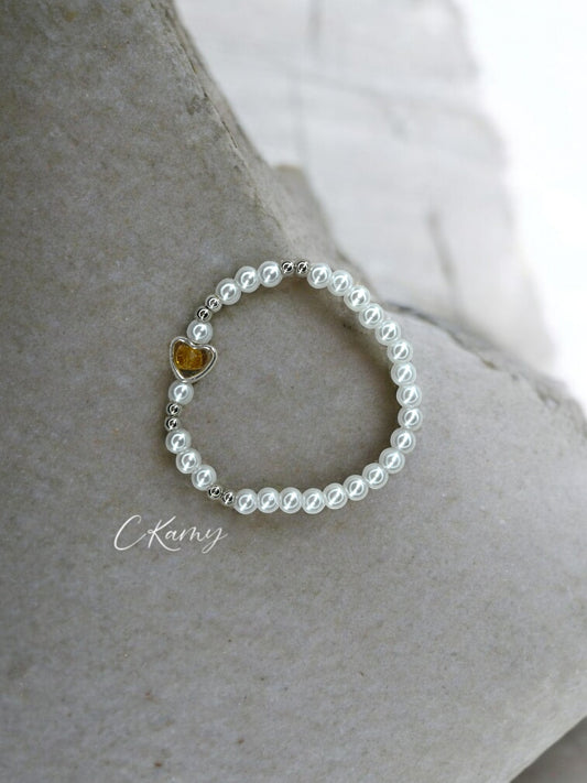 Bracelet femme perles nacrées coeur facette beige