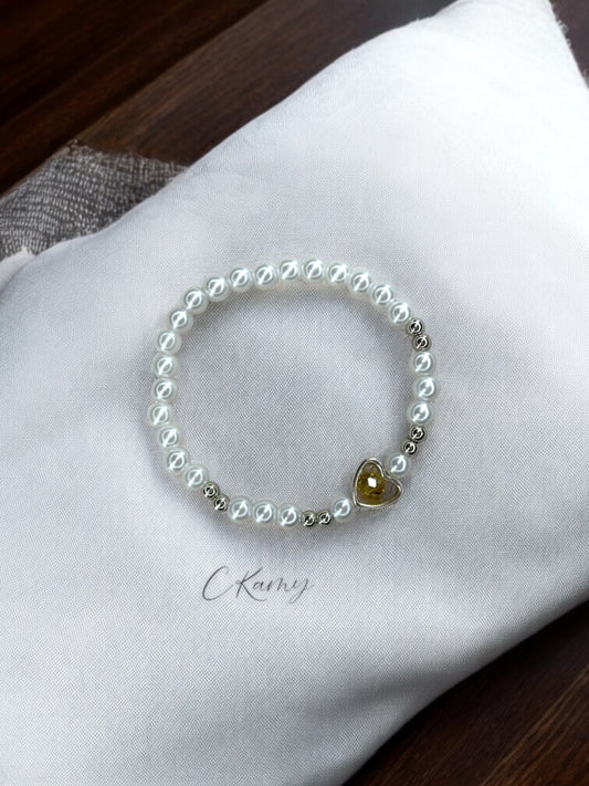 Bracelet femme perles nacrées coeur facette jaune miel