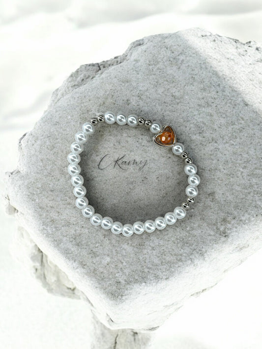 Bracelet femme perles nacrées coeur facette orange clair