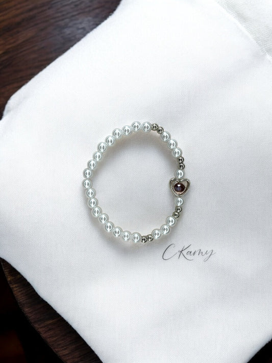 Bracelet femme perles nacrées coeur facette pourpre