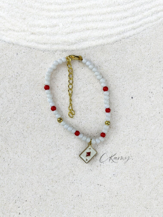 Bracelet femme perles rondes carte de jeu carreau