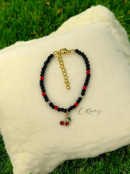 Bracelet femme perles rondes cerises noir