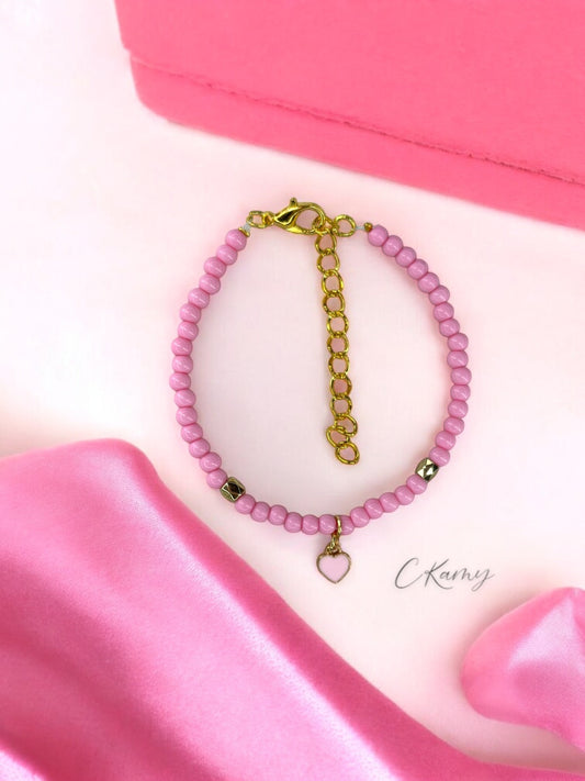 Bracelet femme perles rondes petit coeur rose clair