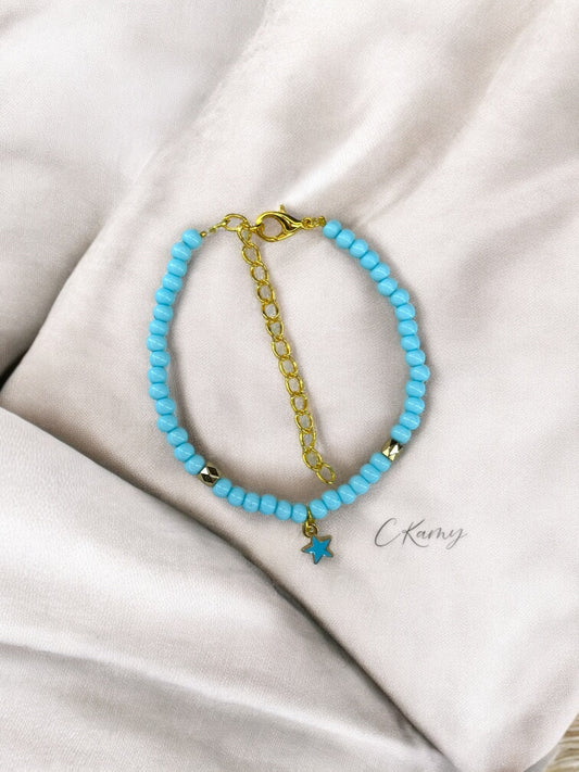 Bracelet femme perles rondes petite étoile bleu