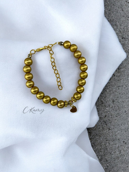 Bracelet femme petit coeur doré doré foncé mat