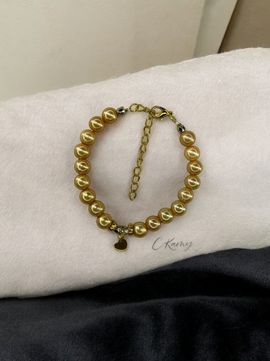 Bracelet femme petit coeur doré jaune blond brillant