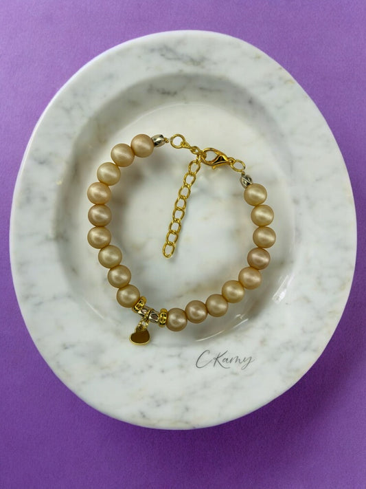 Bracelet femme petit coeur doré jaune sable mat
