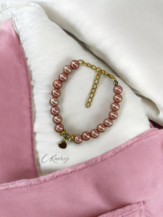 Bracelet femme petit coeur doré rose pêche brillant