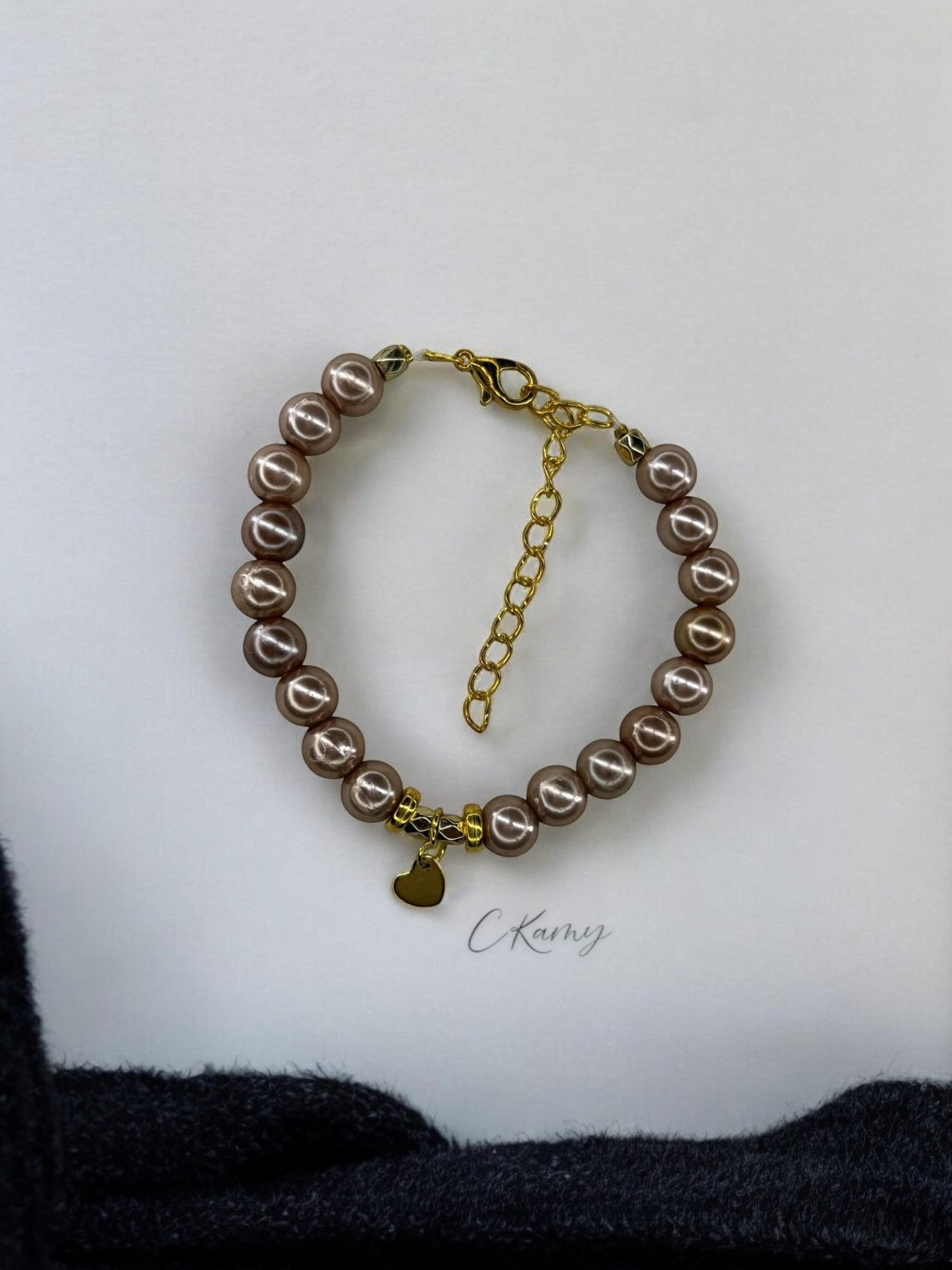 Bracelet femme petit coeur doré taupe brillant