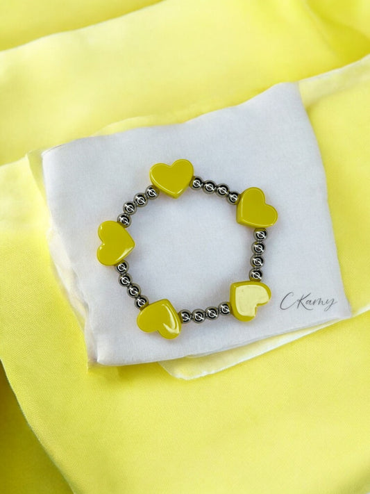 Bracelet femme tour en coeur jaune