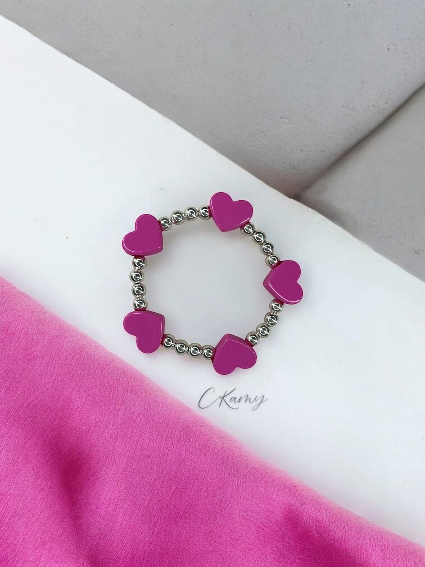 Bracelet femme tour en coeur rose