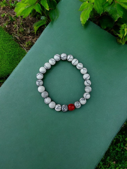 Bracelet homme bicolore blanc à traits perle rouge à traits
