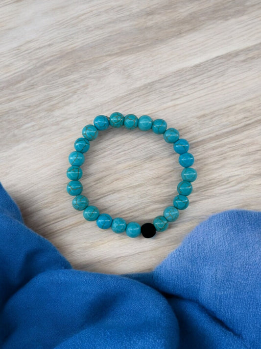 Bracelet homme bicolore bleu à traits perle noir mat