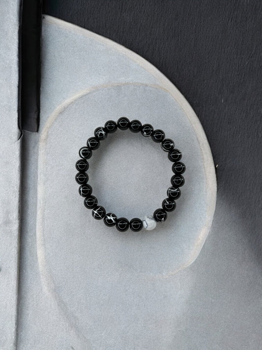 Bracelet homme bicolore noir à traits perle blanc à traits