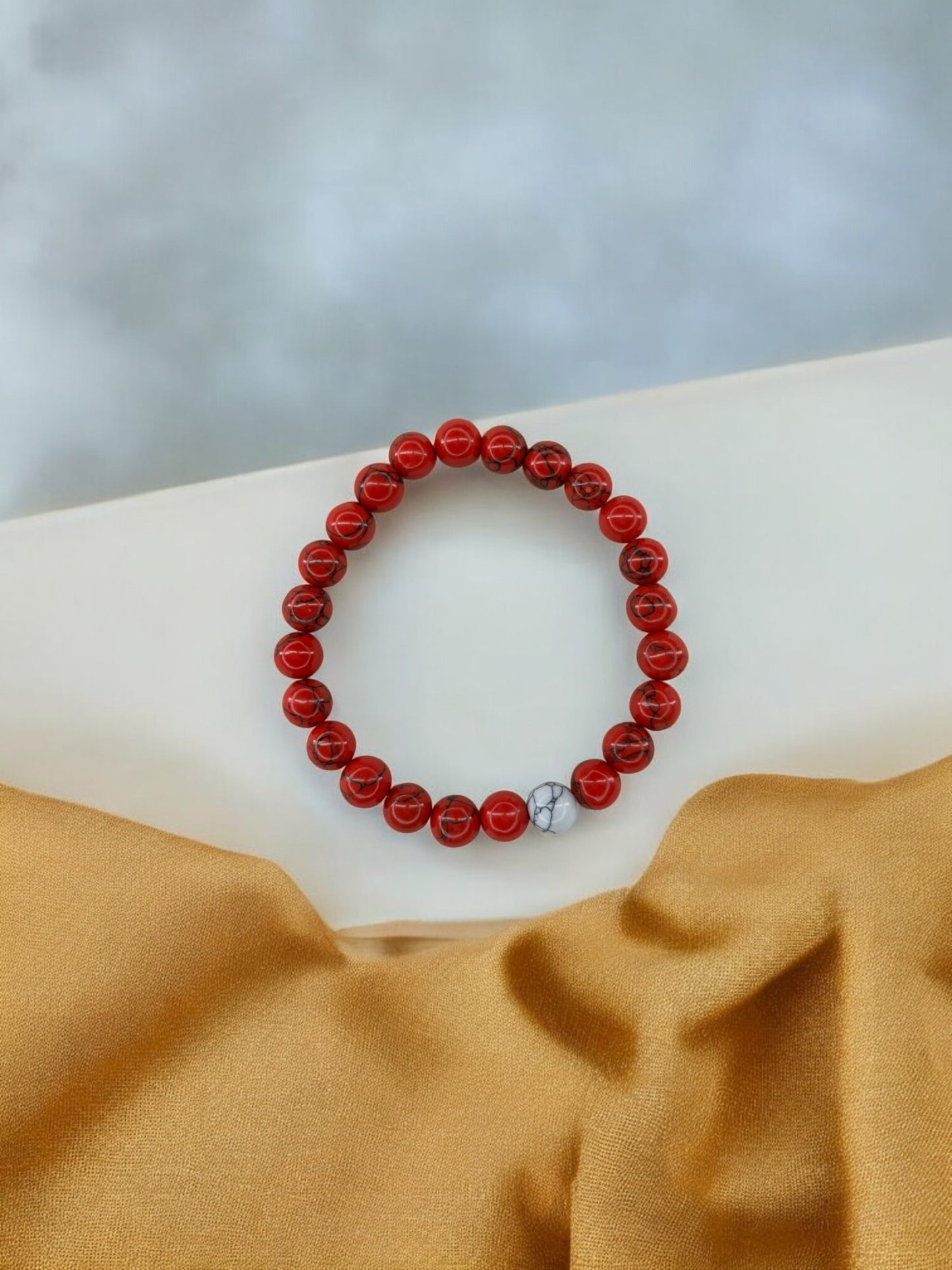 Bracelet homme bicolore rouge à traits perle blanc à traits