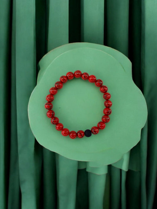 Bracelet homme bicolore rouge à traits perle noir mat