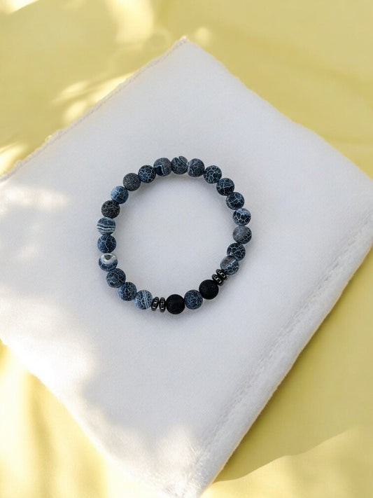 Bracelet homme intercalaires milieu une perle gris