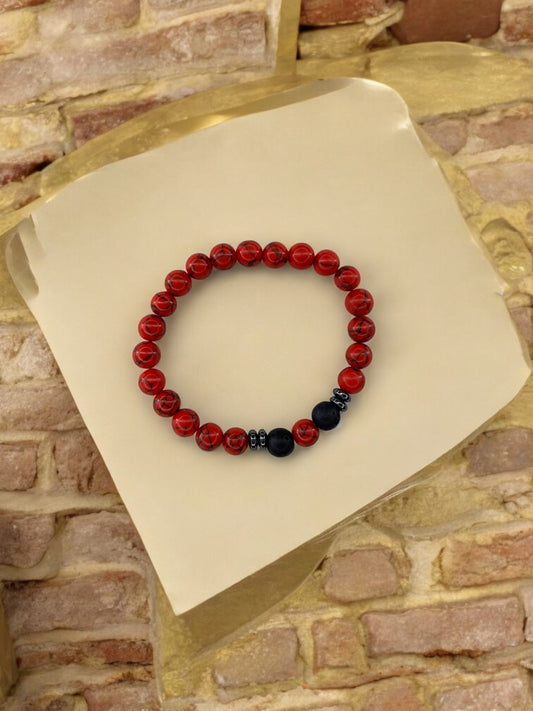 Bracelet homme intercalaires milieu une perle rouge