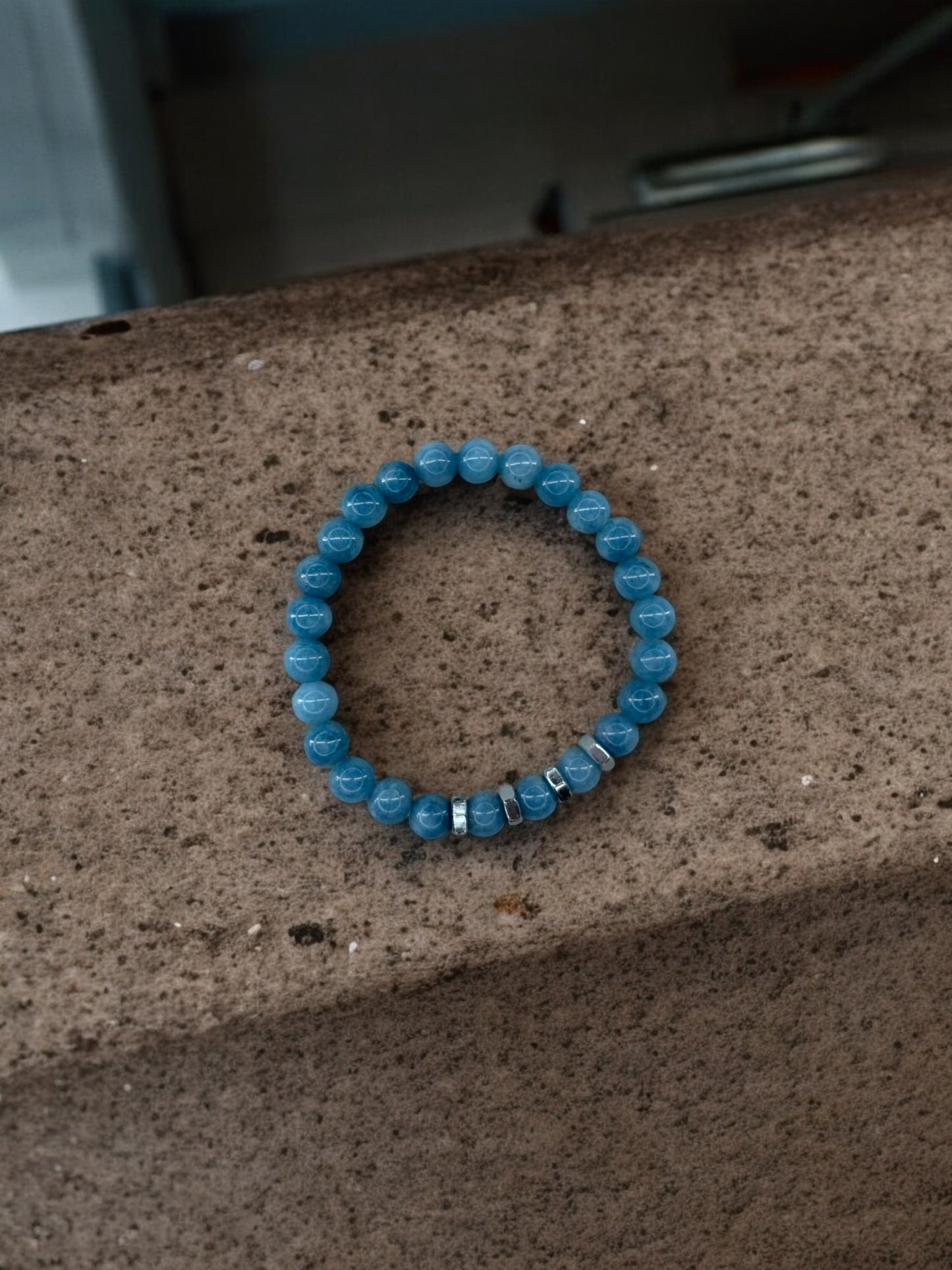 Bracelet homme quatre écrous perles bleu