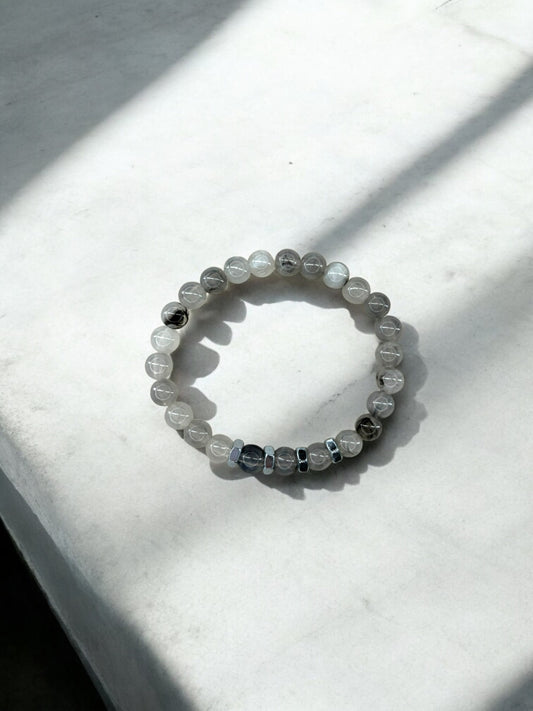 Bracelet homme quatre écrous perles gris clair