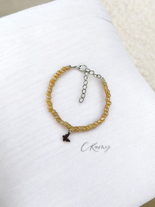 Bracelet papillon rocaille beige