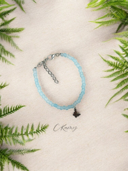Bracelet papillon rocaille bleu transparent