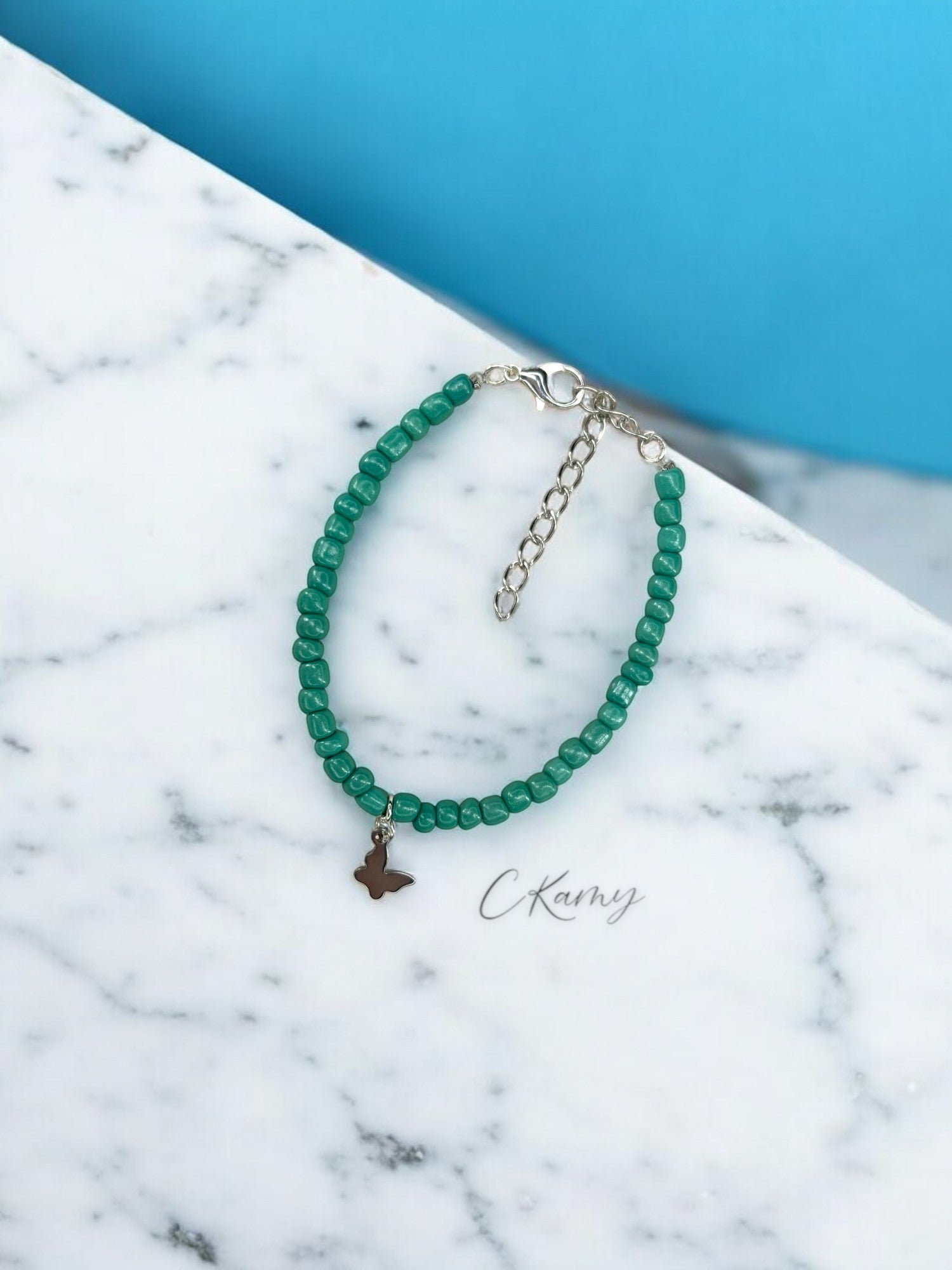 Bracelet papillon rocaille bleu vert