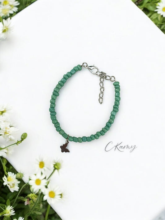 Bracelet papillon rocaille bleu vert clair