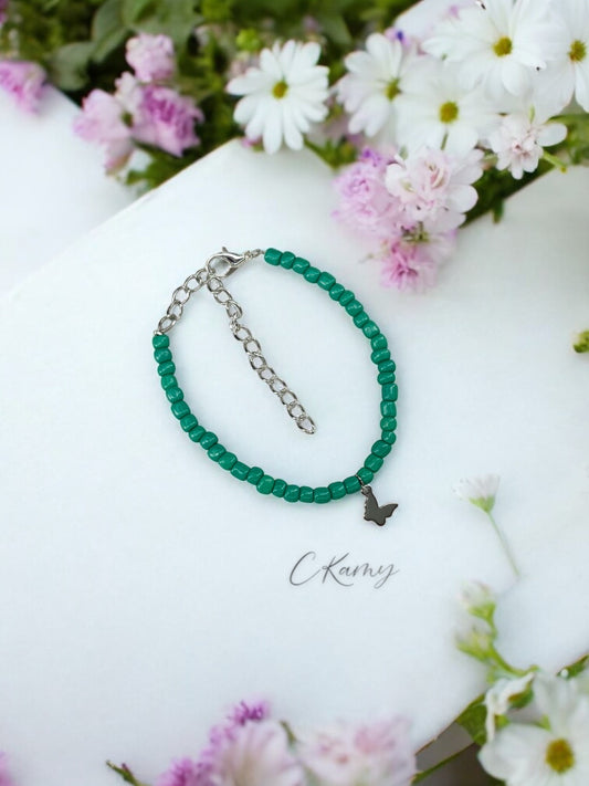 Bracelet papillon rocaille bleu vert foncé