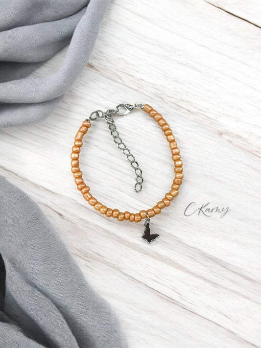 Bracelet papillon rocaille chair foncé