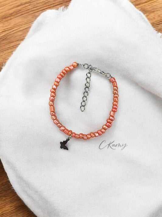 Bracelet papillon rocaille rose corail