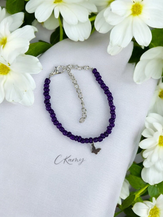 Bracelet papillon rocaille violet foncé
