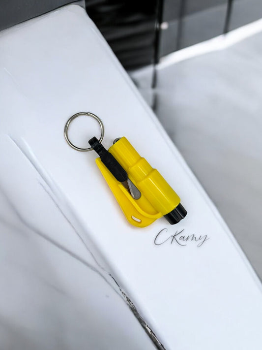 Porte clé brise vitre / coupe ceinture jaune