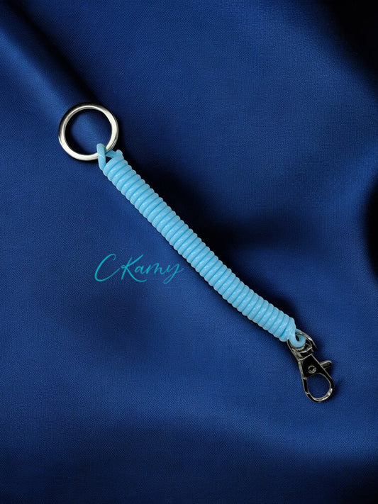 Porte clé câble spirale bleu clair