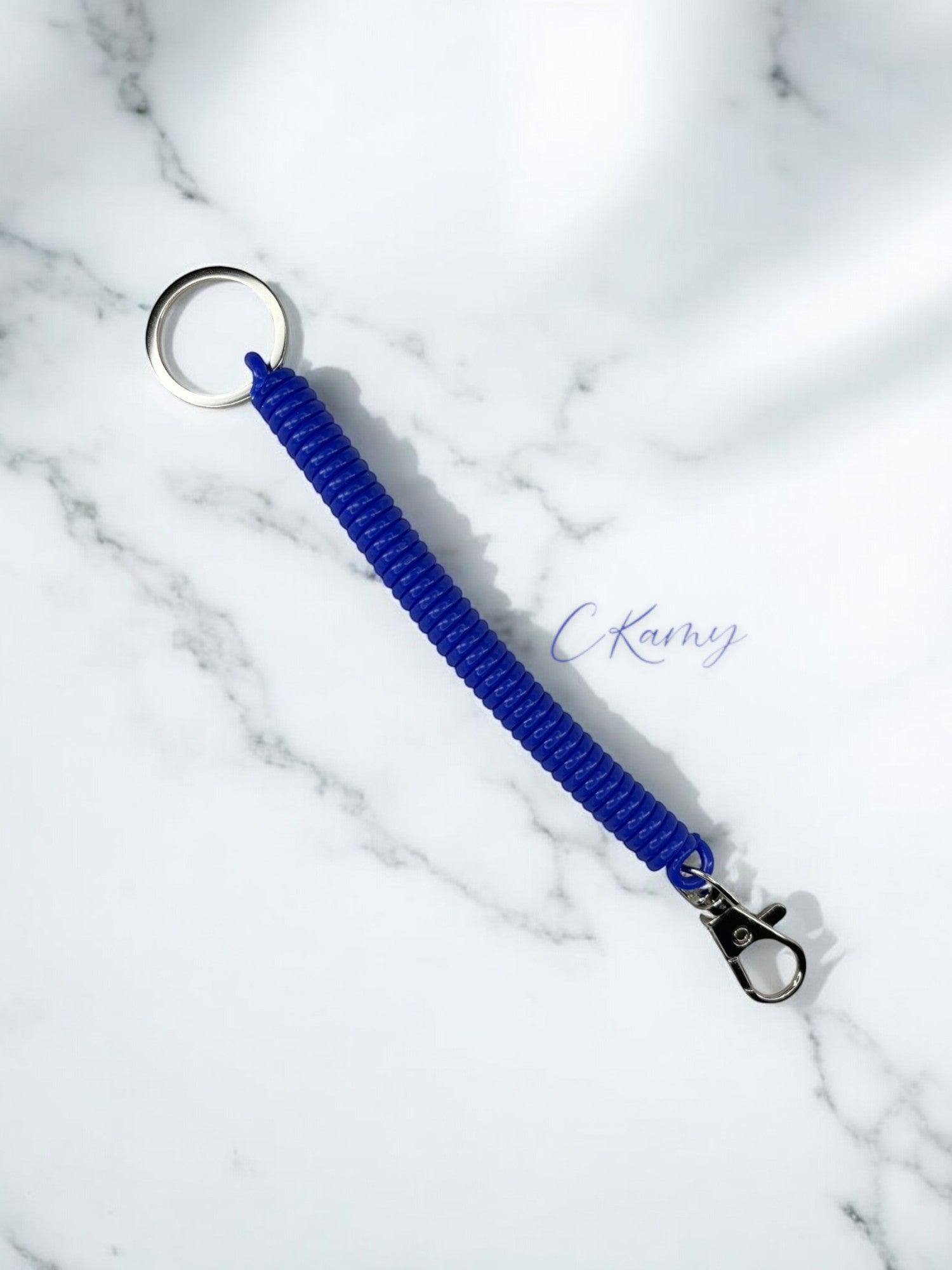 Porte clé câble spirale bleu foncé