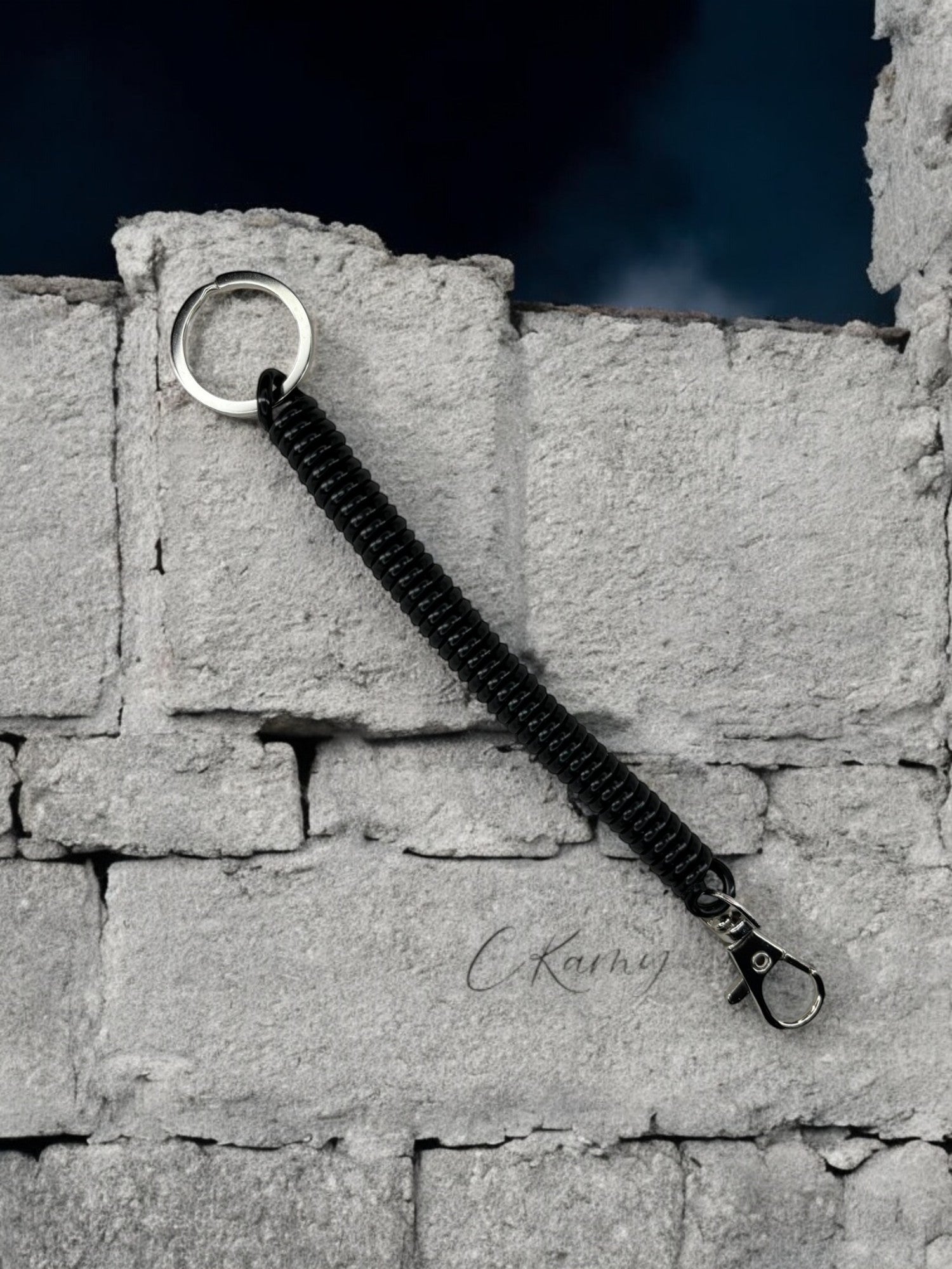 Porte clé câble spirale noir