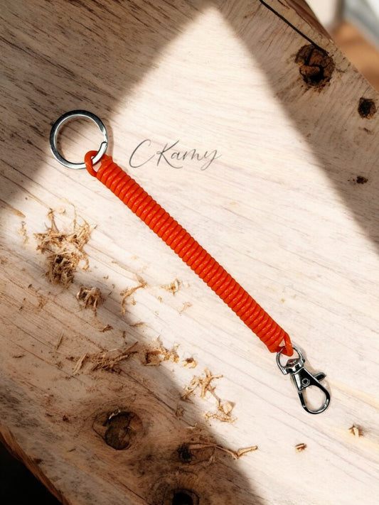 Porte clé câble spirale orange
