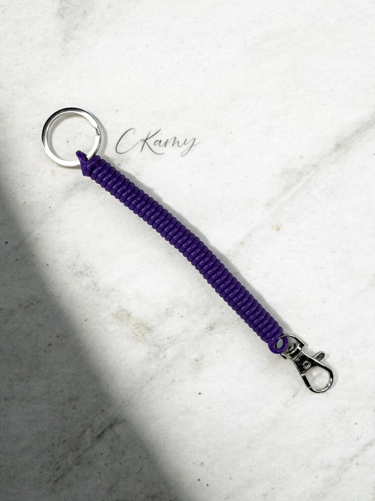 Porte clé câble spirale violet
