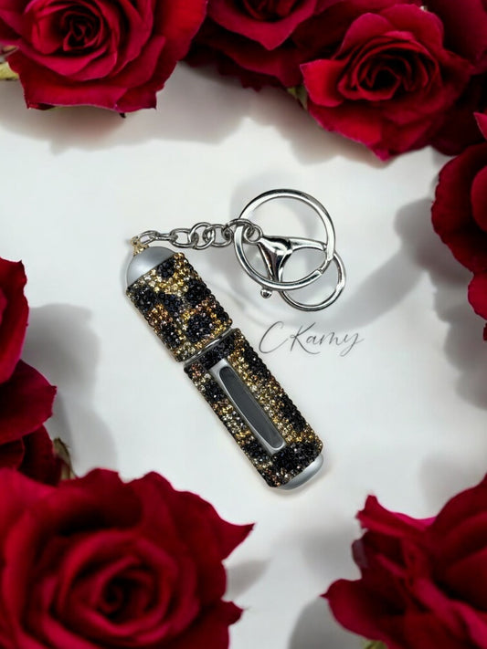 Porte clé contenant pour parfum léopard