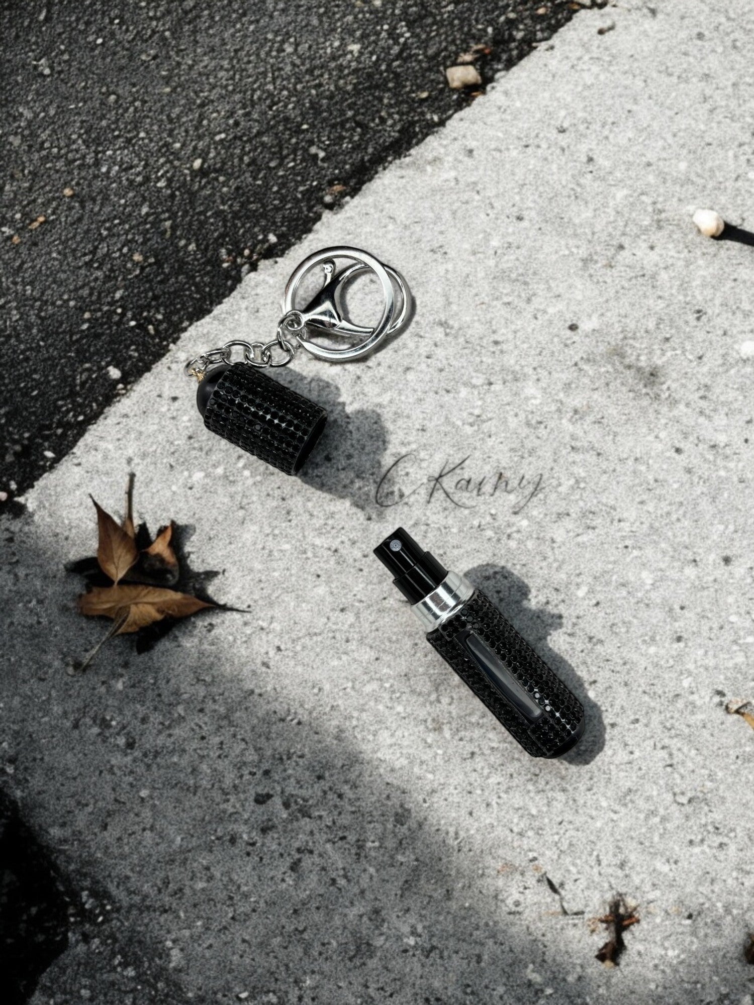 Porte clé contenant pour parfum noir