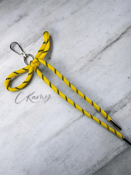 Porte clé lacet noeud jaune