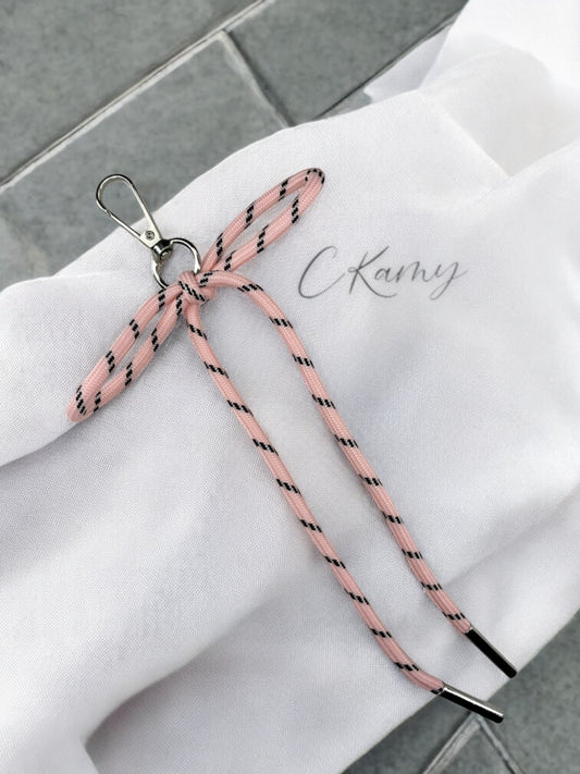 Porte clé lacet noeud rose clair