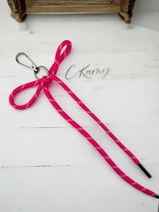 Porte clé lacet noeud rose flash