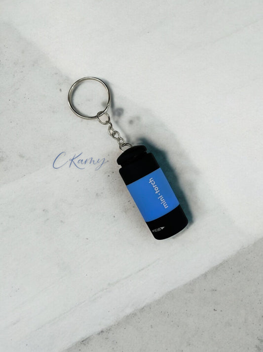Porte clé lampe de poche bleu